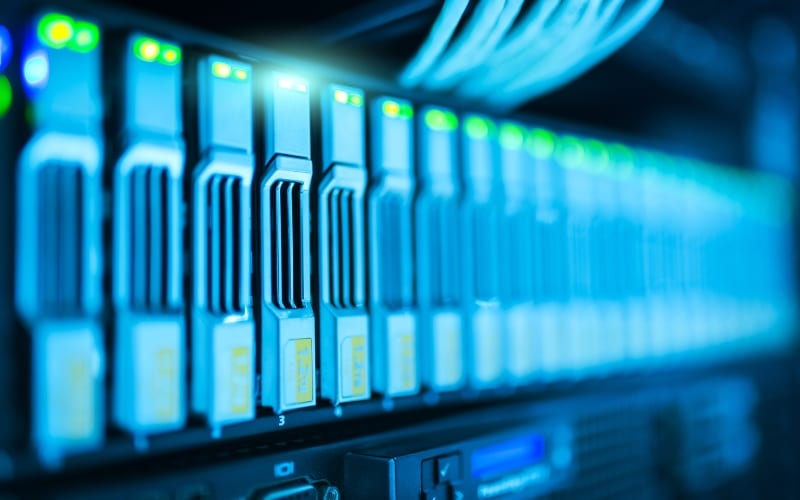 close-up of server hardware with illuminated status lights